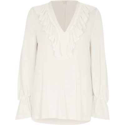 Cream frill V neck long sleeve blouse